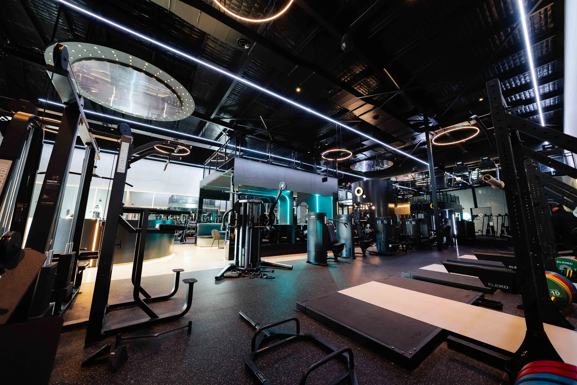 TODAY Fitness gym floor fit-out with rubber flooring, strength equipment and linear LED lighting